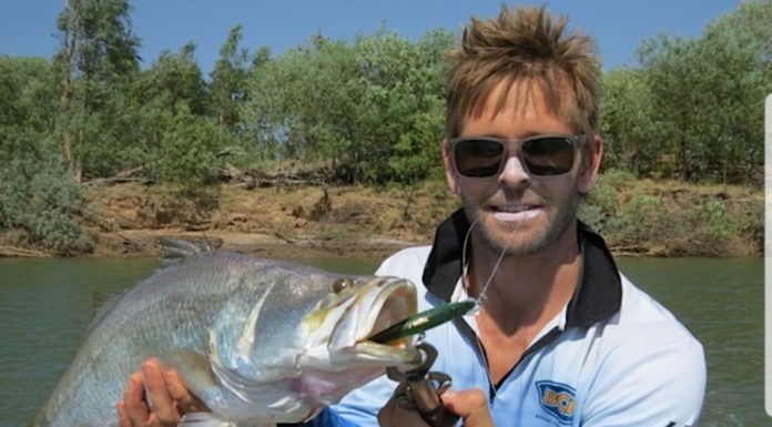 Mark LeCras holding a fish he caught